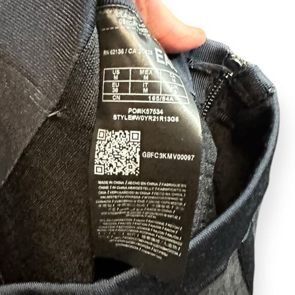 GUESS Women’s Jet Black Multi Logo Mirage Garter Mini Skirt Size Medium NWT - Picture 5 of 7